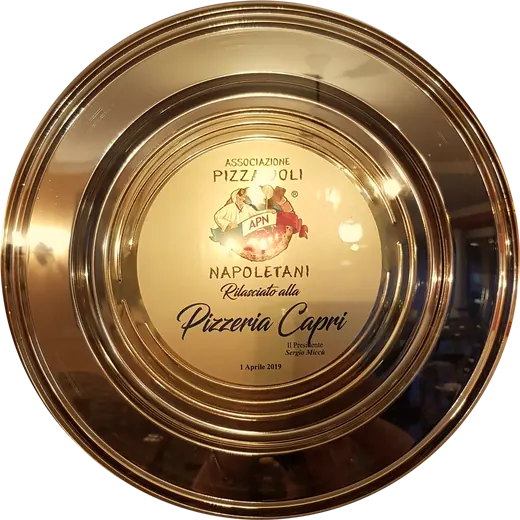 Goldener Pizzateller der Associazione Pizzaiuoli Napoletani, „Rilasciato alla Pizzeria Capri“, 1. April 2019